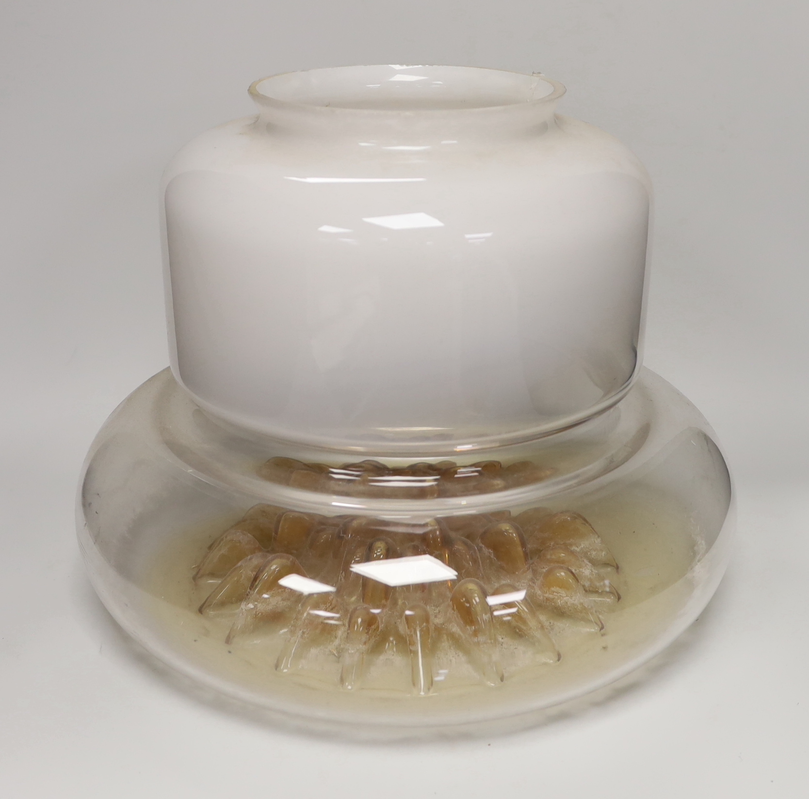 A large 1970's amber and opaque glass ceiling shade, 32cm high